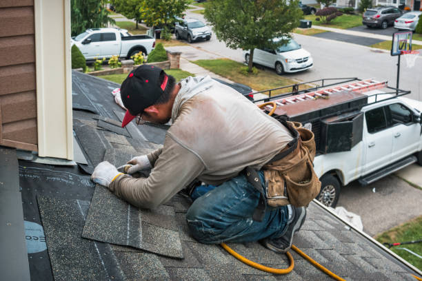 Professional Roofing technician working in Blakely, PA